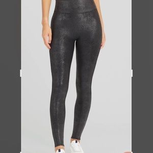 Spanx faux leather reptile print black leggings. Size medium.